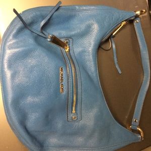 Michael Kors cornflower blue bag.